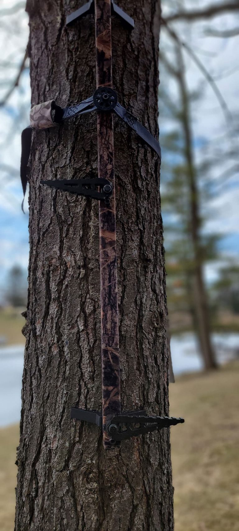 Climbing Stick with Stealth Strips® on tree