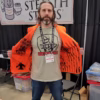Hunting Beast Tactical Vest in Safety Orange front on person showing inside